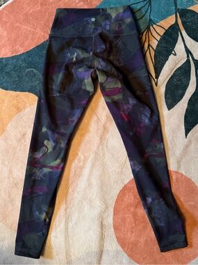 Sz 6 lululemon colorful leggings with green, magenta and purple tones.